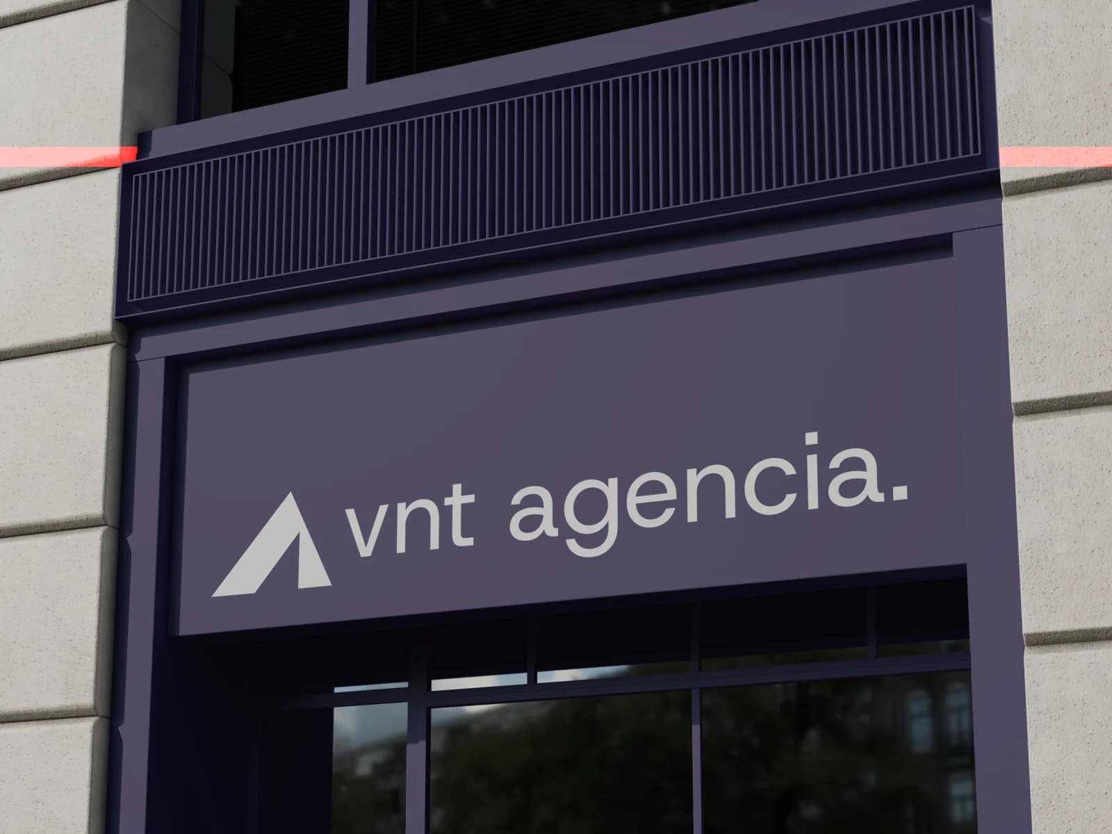 Exterior sign applied to VNT Agencia's façade